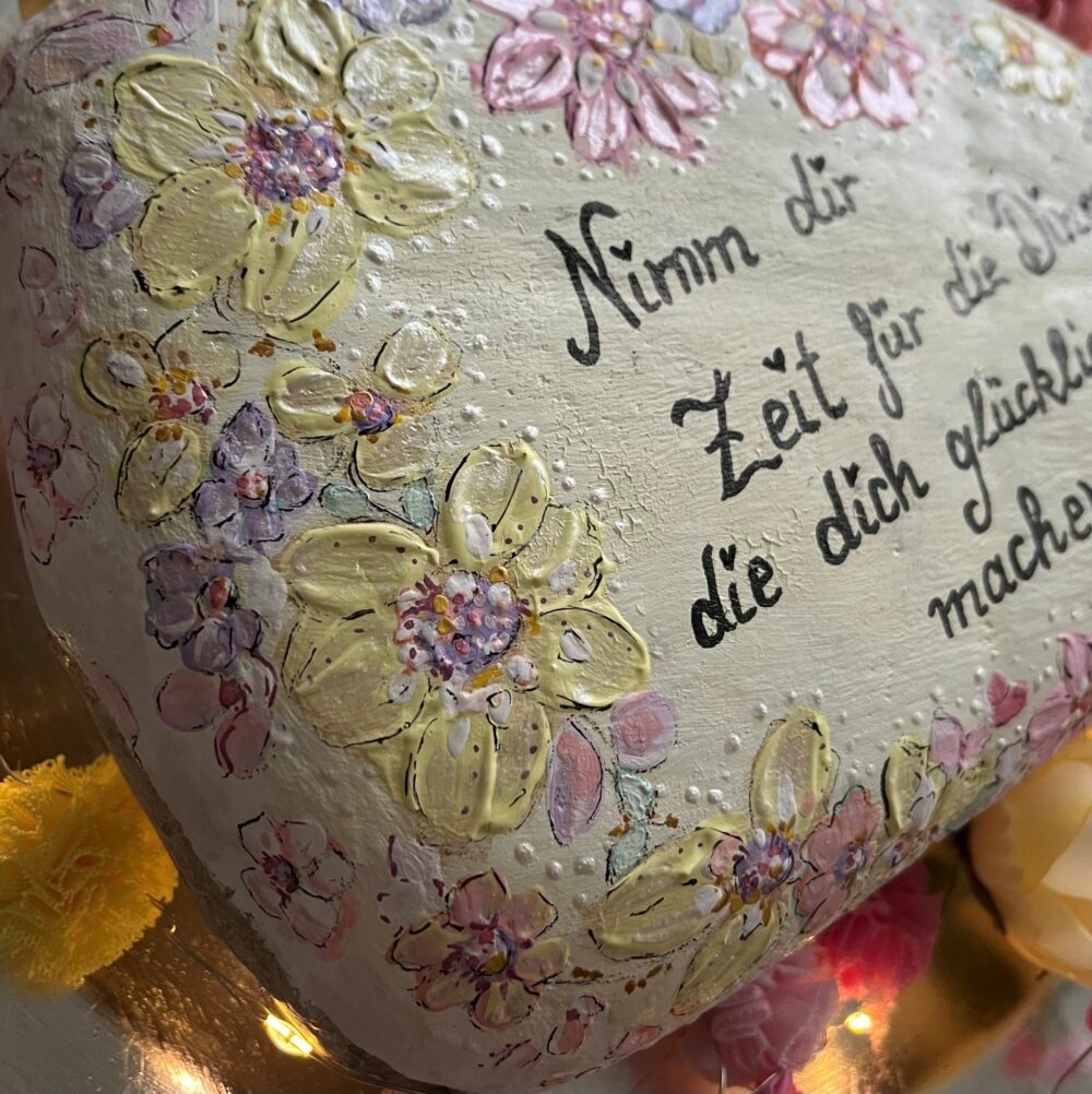 Bemalter Stein mit Spruch Ã¼ber Zeit nehmen